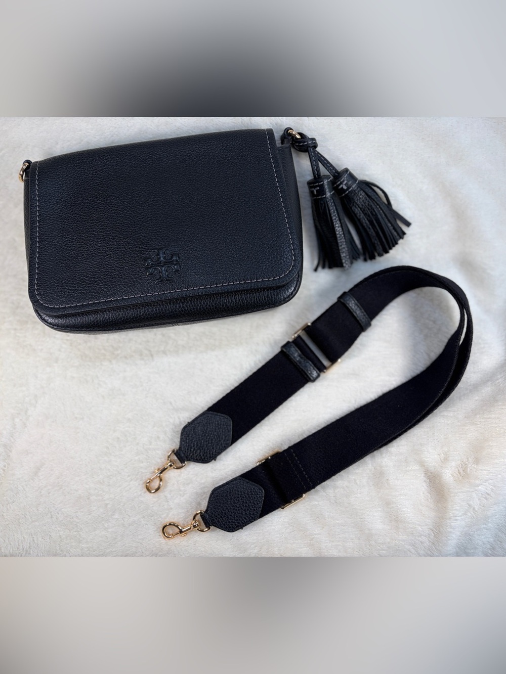 Tory Burch Thea Flap Black Pebbled Leather Crossbody with Tassel and Wide Strap